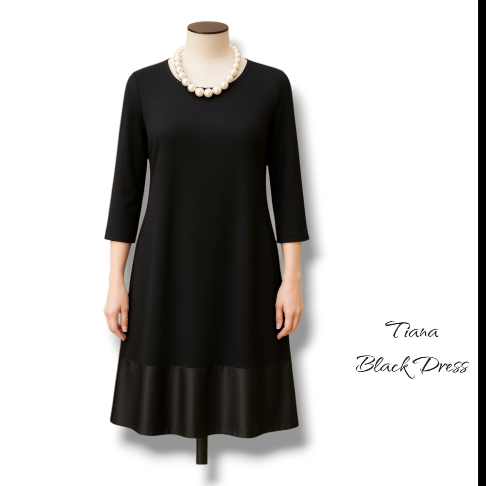 Elegant Black Dress with Pearl Necklace